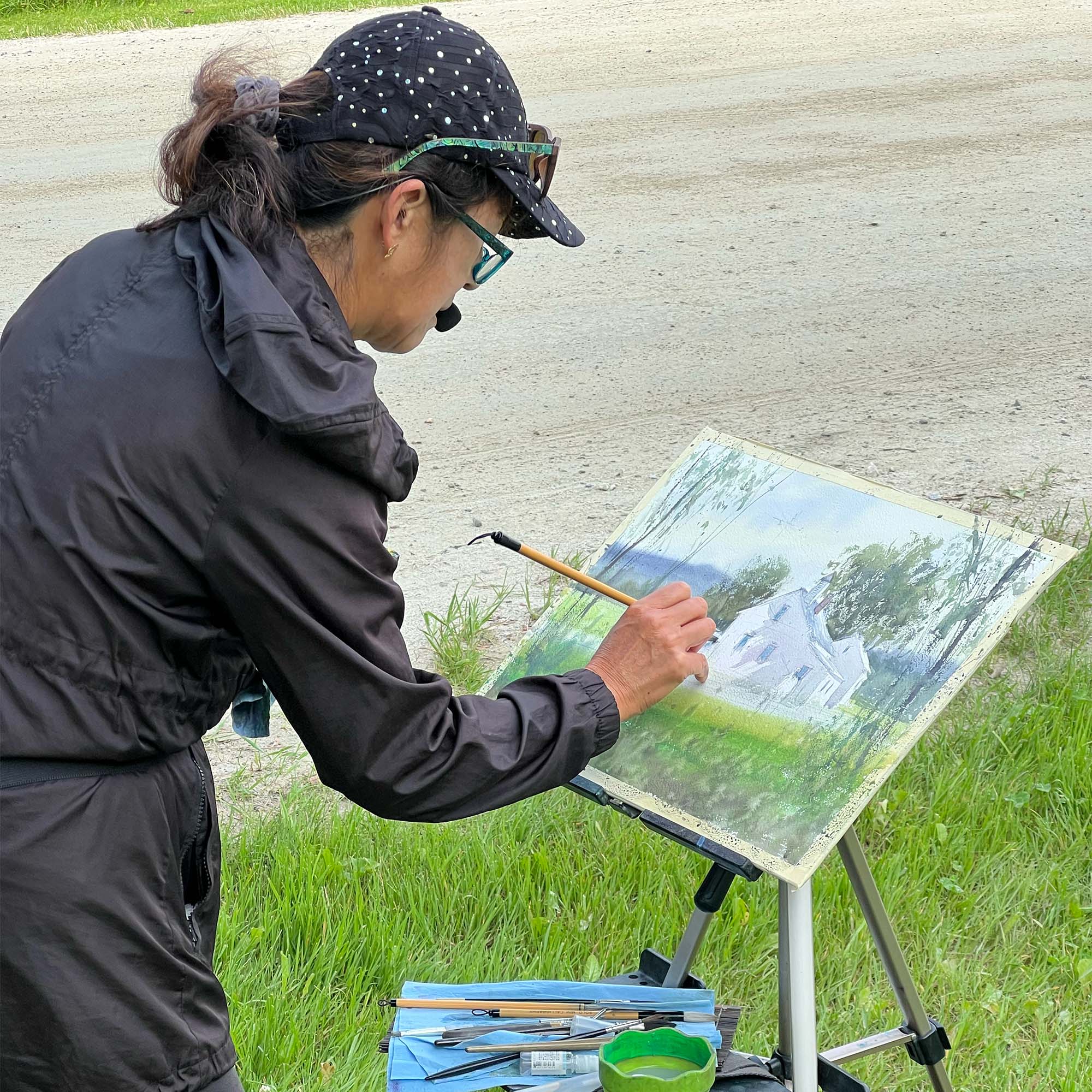 Keiko Tanabe at work during a painting demo.